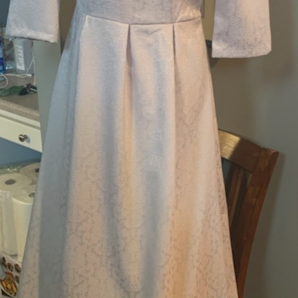 Cream Jacquard Print full length dress.